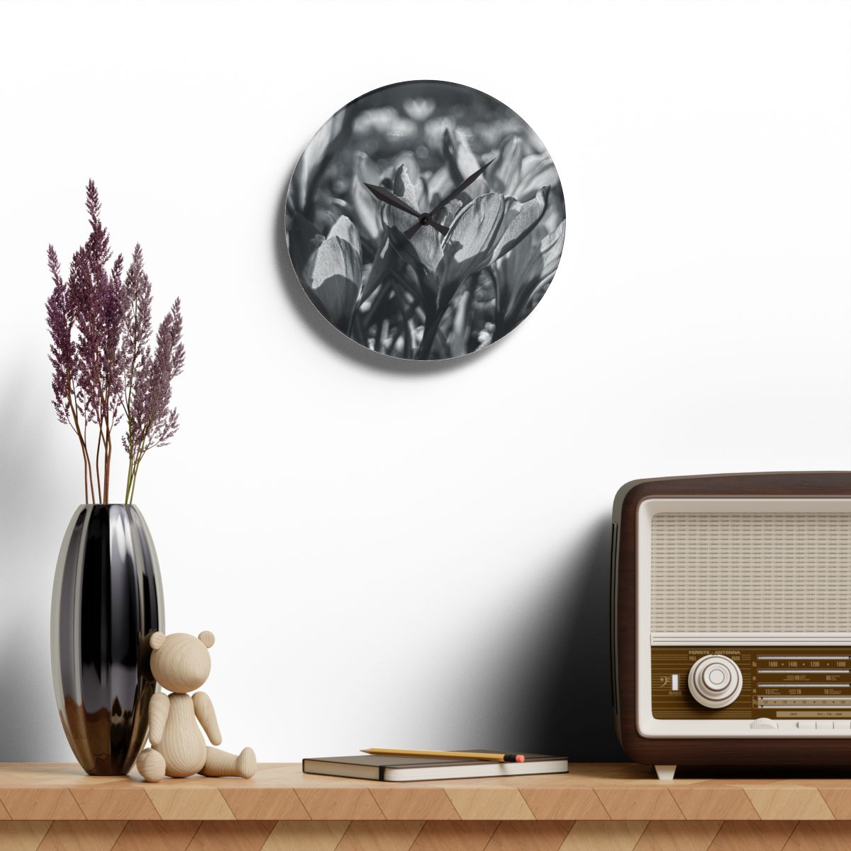 black and white acrylic wall clock featuring crocus