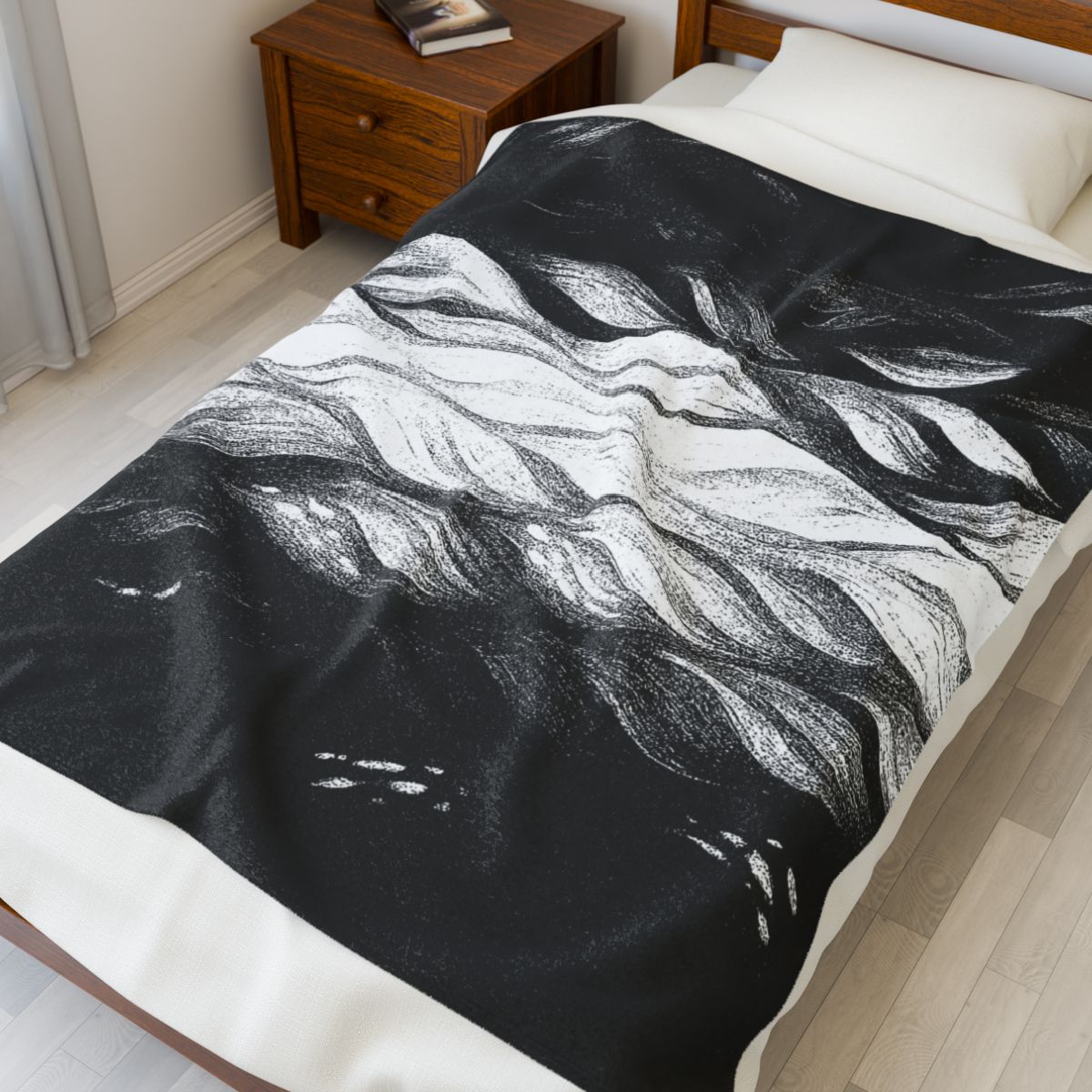 Monochrome Gilded Amethyst blanket, displaying swirling grayscale textures in a modern bedroom
