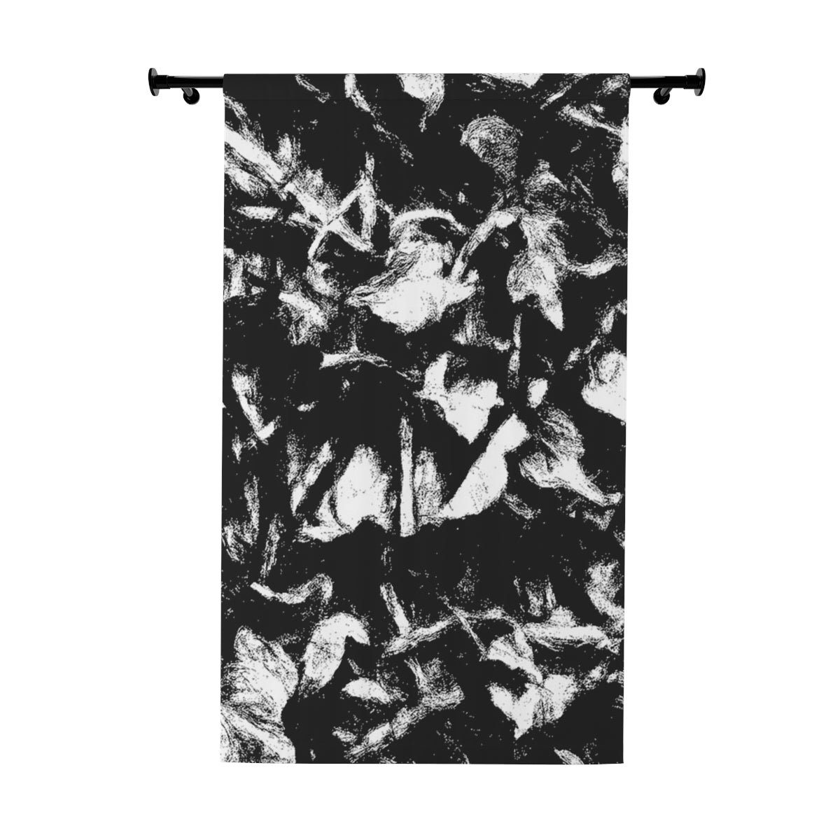 Blackout curtain in high-contrast black and white with expressive leaf textures, presented flat against a plain white background