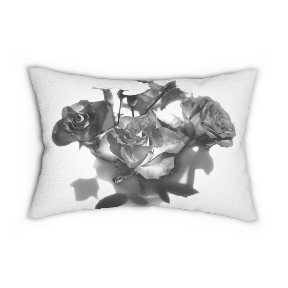 lumbar pillow featuring photograph of black and white roses