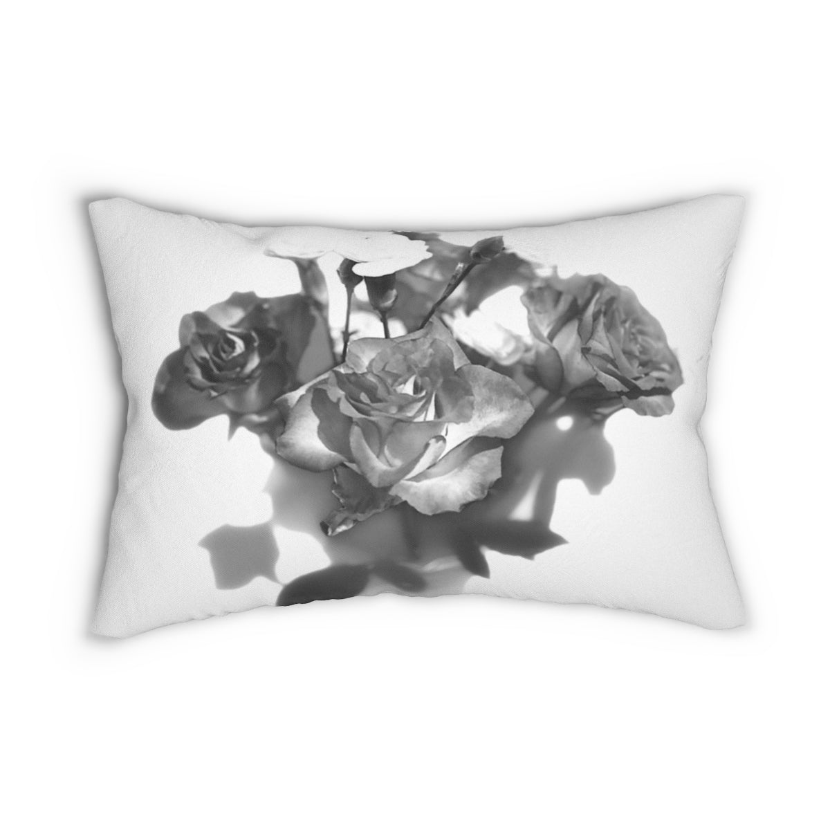 lumbar pillow featuring photograph of black and white roses