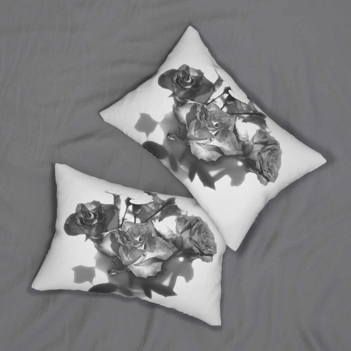 lumbar pillow featuring photograph of black and white roses