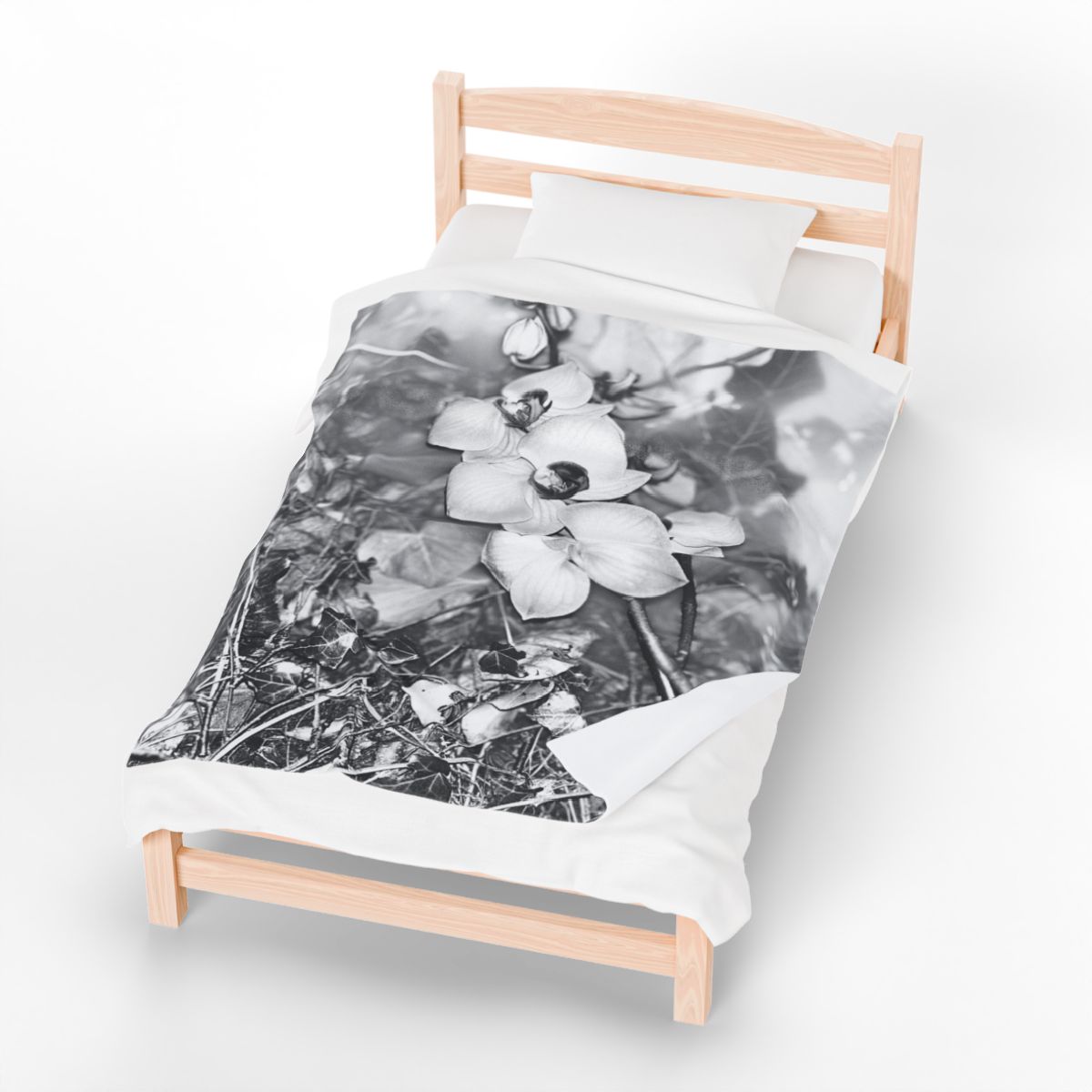 black and white floral throw blanket featuring orchids
