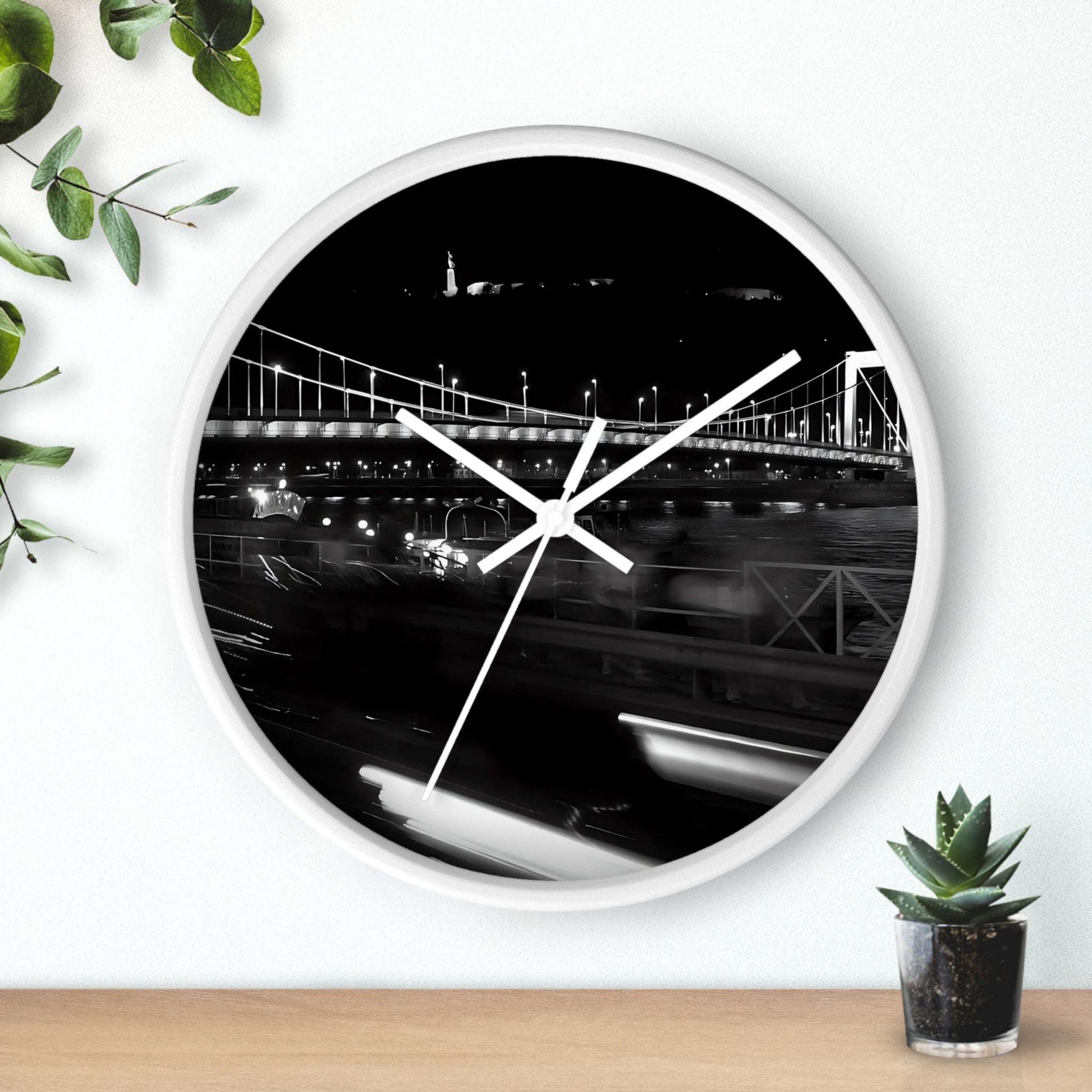 black and white wall clock featuring Budapest by night, bridge over Danube river, and Citadel, base: white: white, handles: white, size: 10''