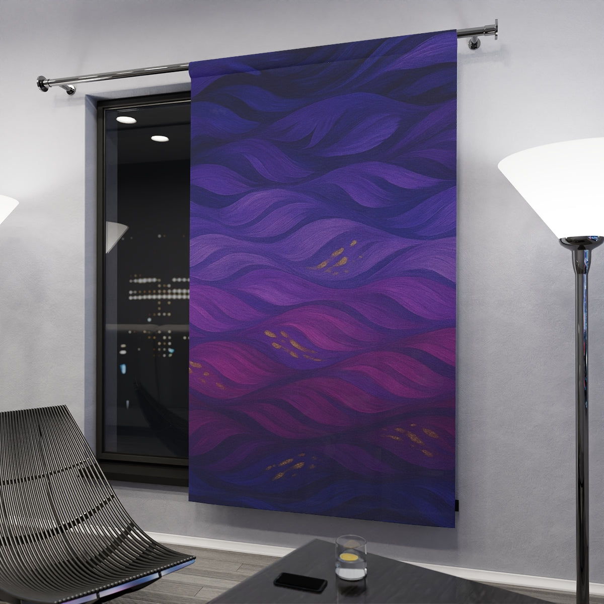 evening setting: Richly colored blackout curtain with deep violet and indigo waves, highlighted by golden specks, displayed in a warm daylight interior—50″ × 84″.