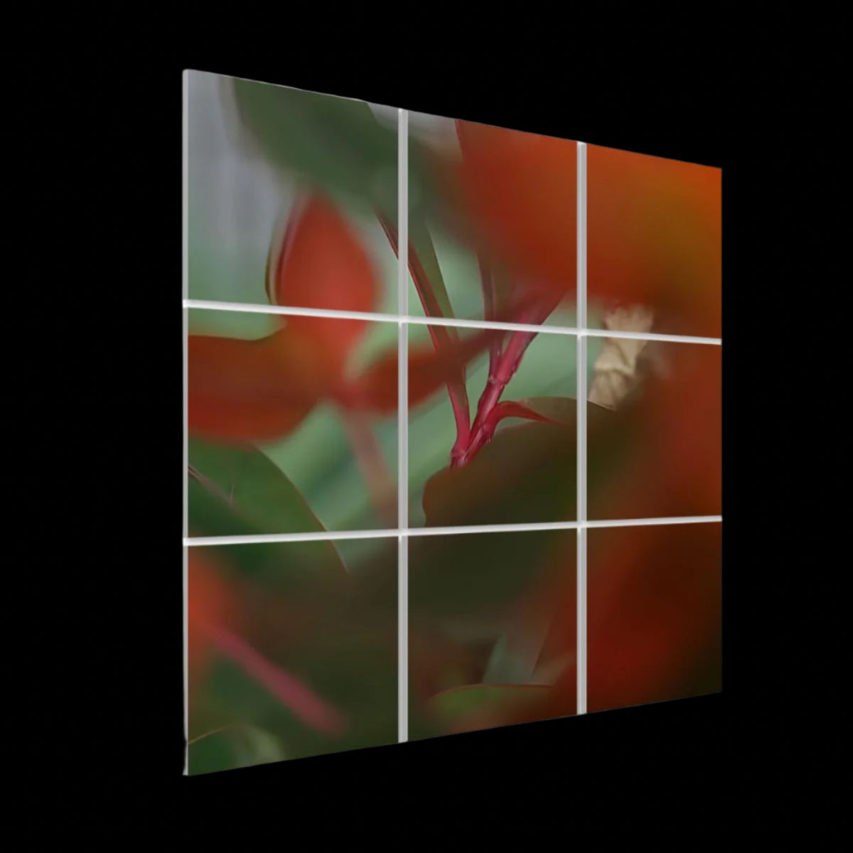 Left‑side angled view of the abstract foliage 9‑panel sound‑absorbing wall art, showing panel depth, seamless edges, and vivid red‑green tones.
