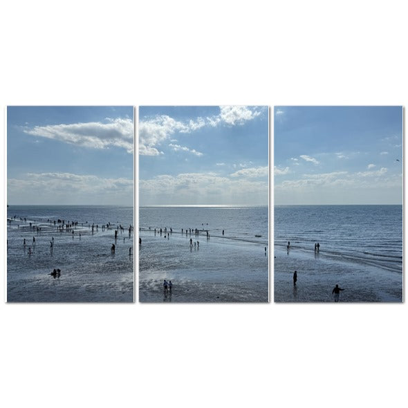 Made in UK Triptych Canvas featuring Beach in Shadow with Sunlight on the Horizon. Seascape with people on wet sand