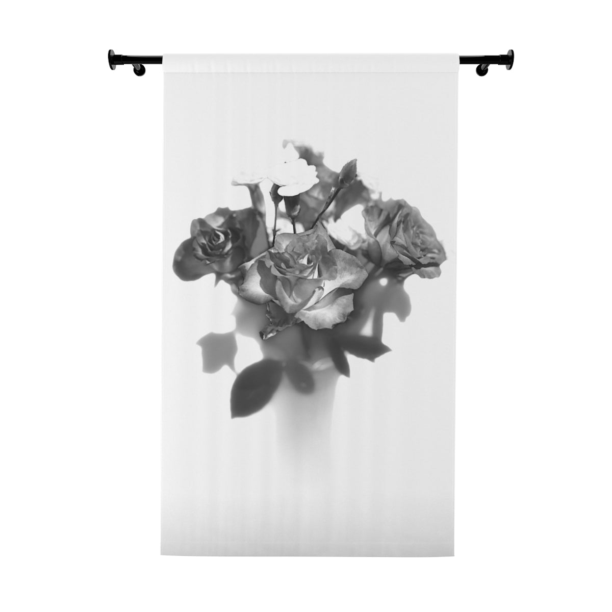 Close-up view: Blackout curtain with a grayscale bouquet of roses in soft focus, petals emerging from gentle shadows on smooth fabric – 50" × 84"