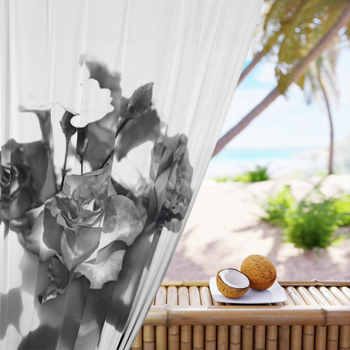 Close-up of soft-focus grayscale rose design printed on curtain, with an outdoor beach view visible through the window in the background – 50" × 84".