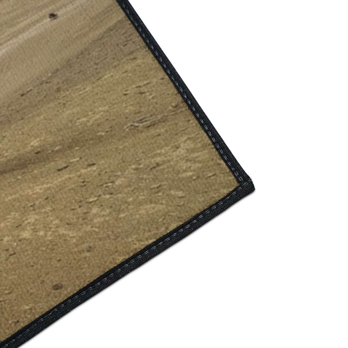 close ou of the corner of Heavy Duty Floor Mat featuring desert and pyramids of giza