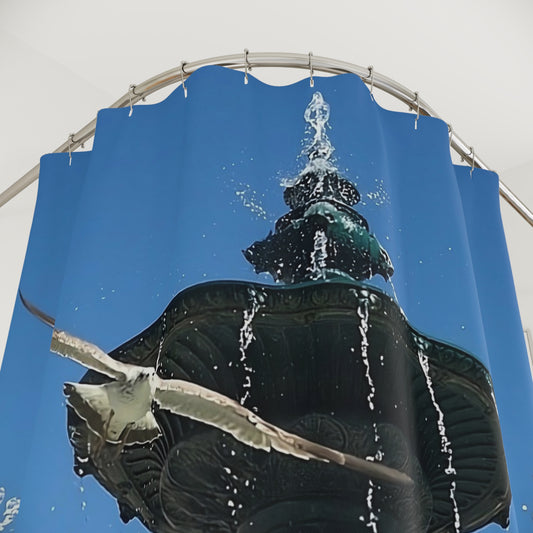 Designer shower curtain featuring seagull from Lisbon in flight with fountain in background, size 71’’x74’’