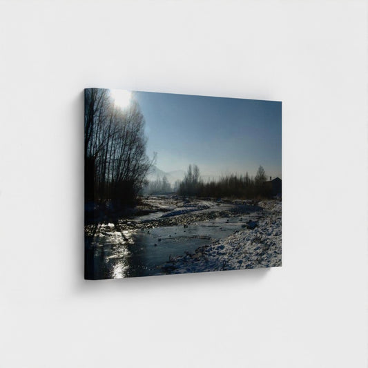 Eco-Friendly Landscape Wall Art featuring a river and forest in winter under a clear blue sky