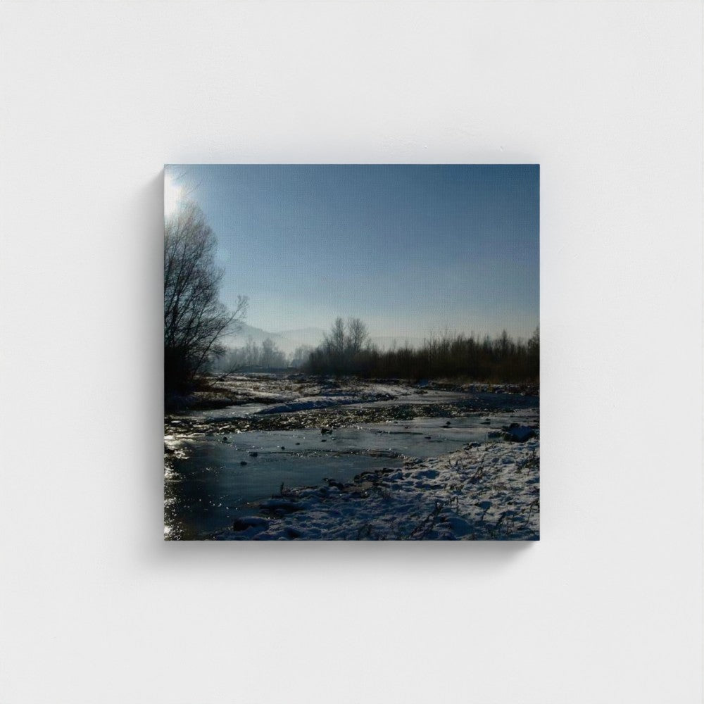 Papi's Canvas eco-friendly landscape wall art featuring a river in winter under a clear blue sky