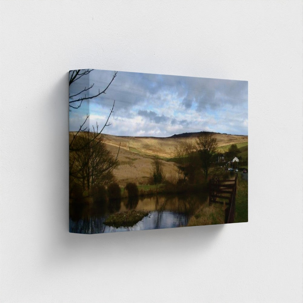 Papi's Canvas Eco-Friendly Wall Art featuring a serene countryside landscape with hills and reflective water
