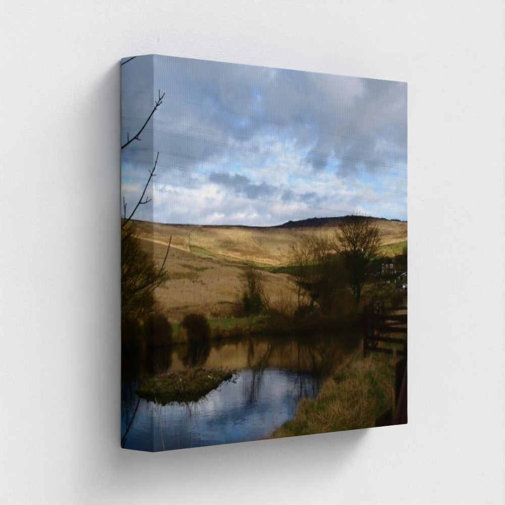 Papi's Canvas Eco-Friendly Wall Art of a serene countryside landscape with a reflective pond and cloudy sky