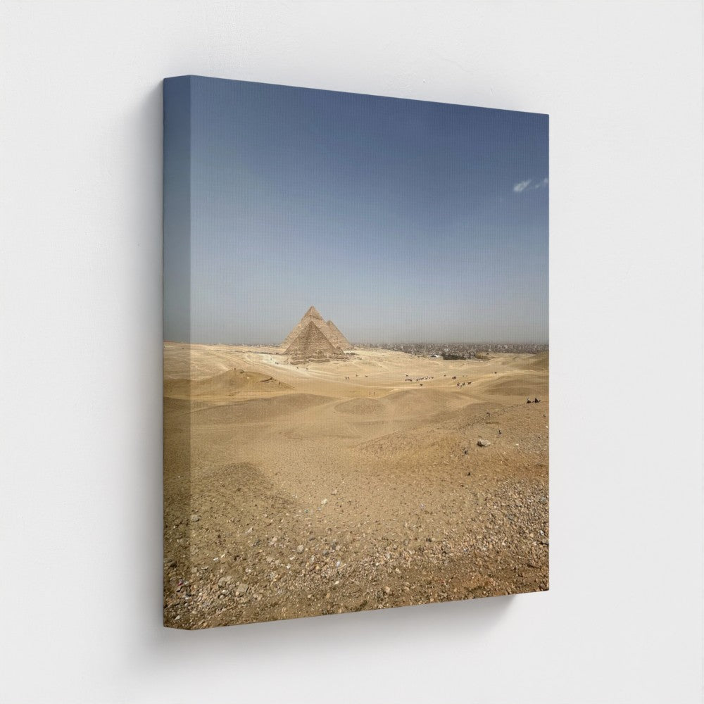 Papi's Canvas Eco-Friendly Wall Decor featuring a desert landscape with a pyramid under a clear blue sky