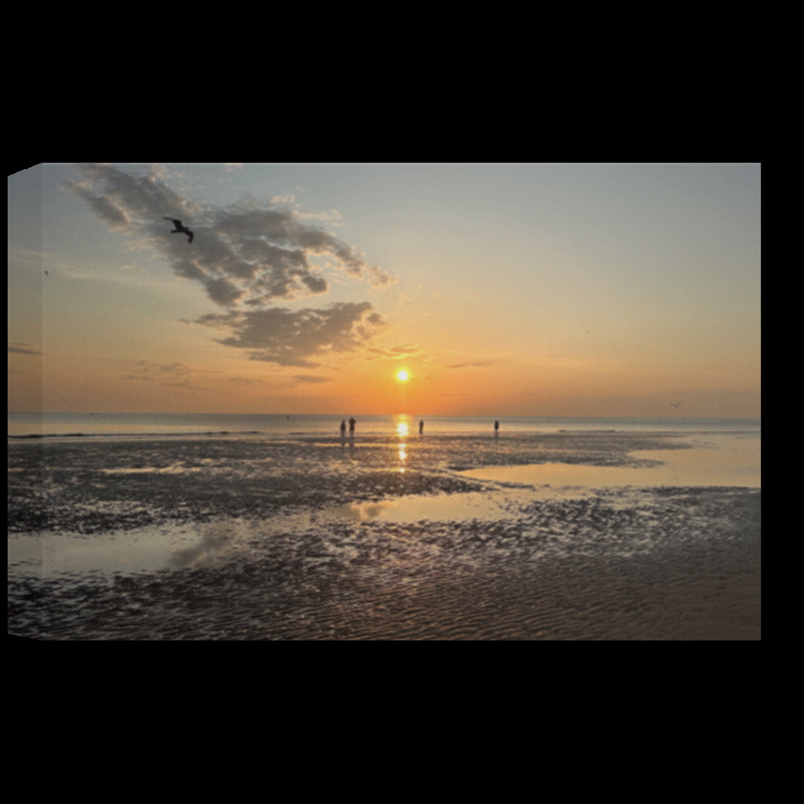 Eco-friendly canvas wall art featuring a Blackpool beach sunset with silhouettes of people on reflective wet sand