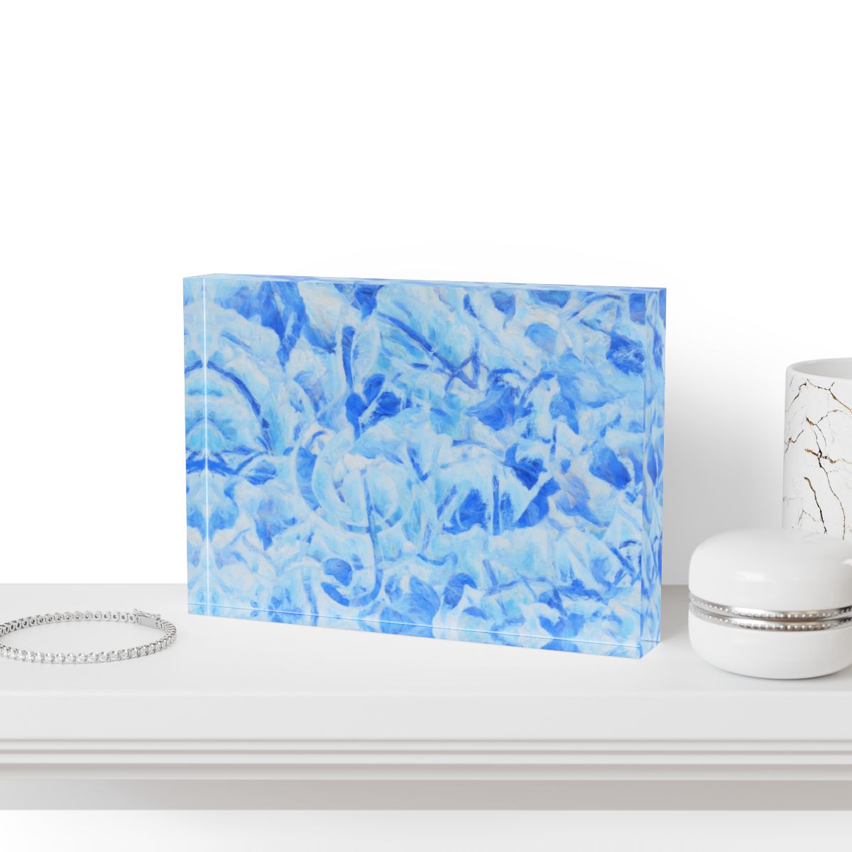 Mockup of block styled on a glass desk with coastal-inspired accessories