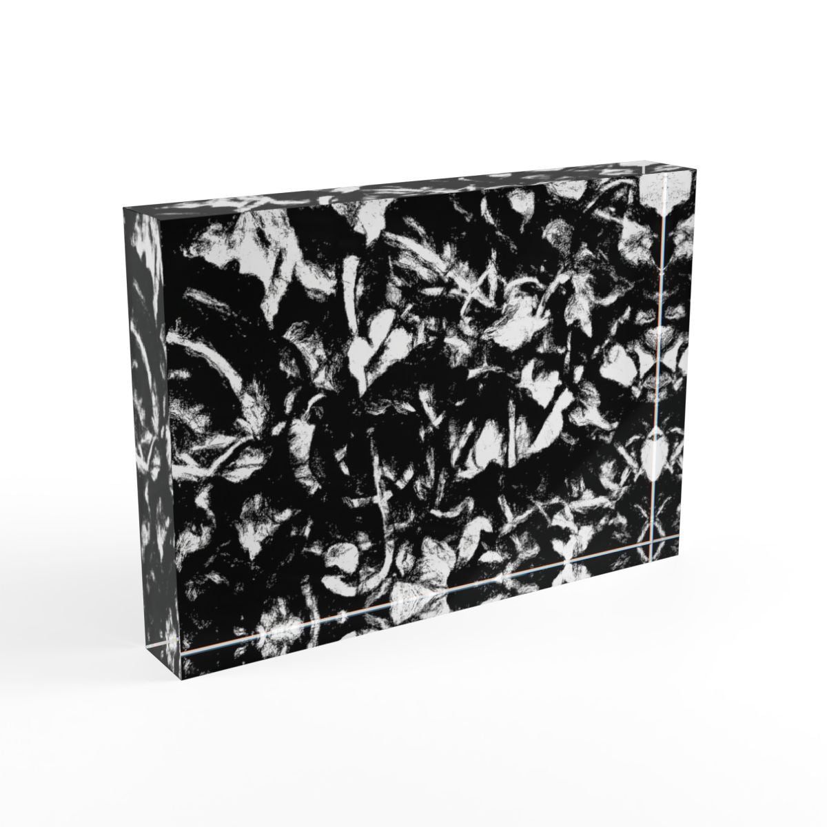 Left profile showing polished edges that highlight tonal depth in monochrome design