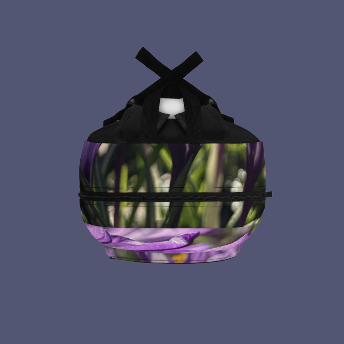 Top-down view of backpack showing purple crocus flower design across the top handle and upper panels.