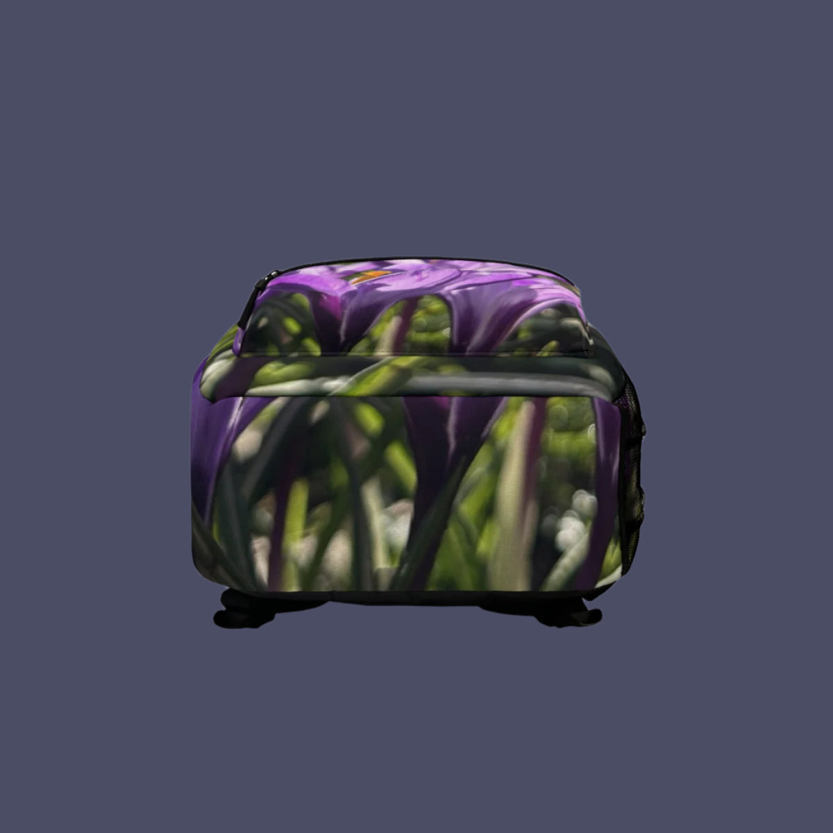 Bottom of backpack with high-resolution purple crocus floral print and reinforced stitching details.