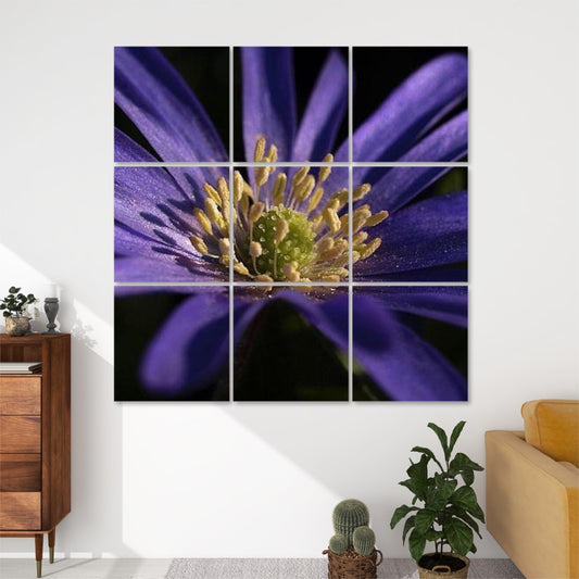 Living‑room mock‑up displaying the 3 × 3 purple anemone acoustic panels above a sofa, illustrating scale and décor integration.