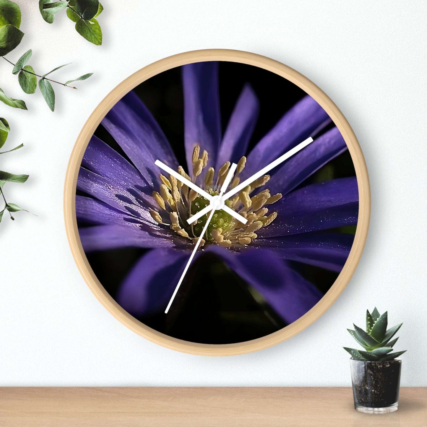 Floral Wall Clock featuring close up of purple anemone flower, base: wooden, hands: white, size: 10''