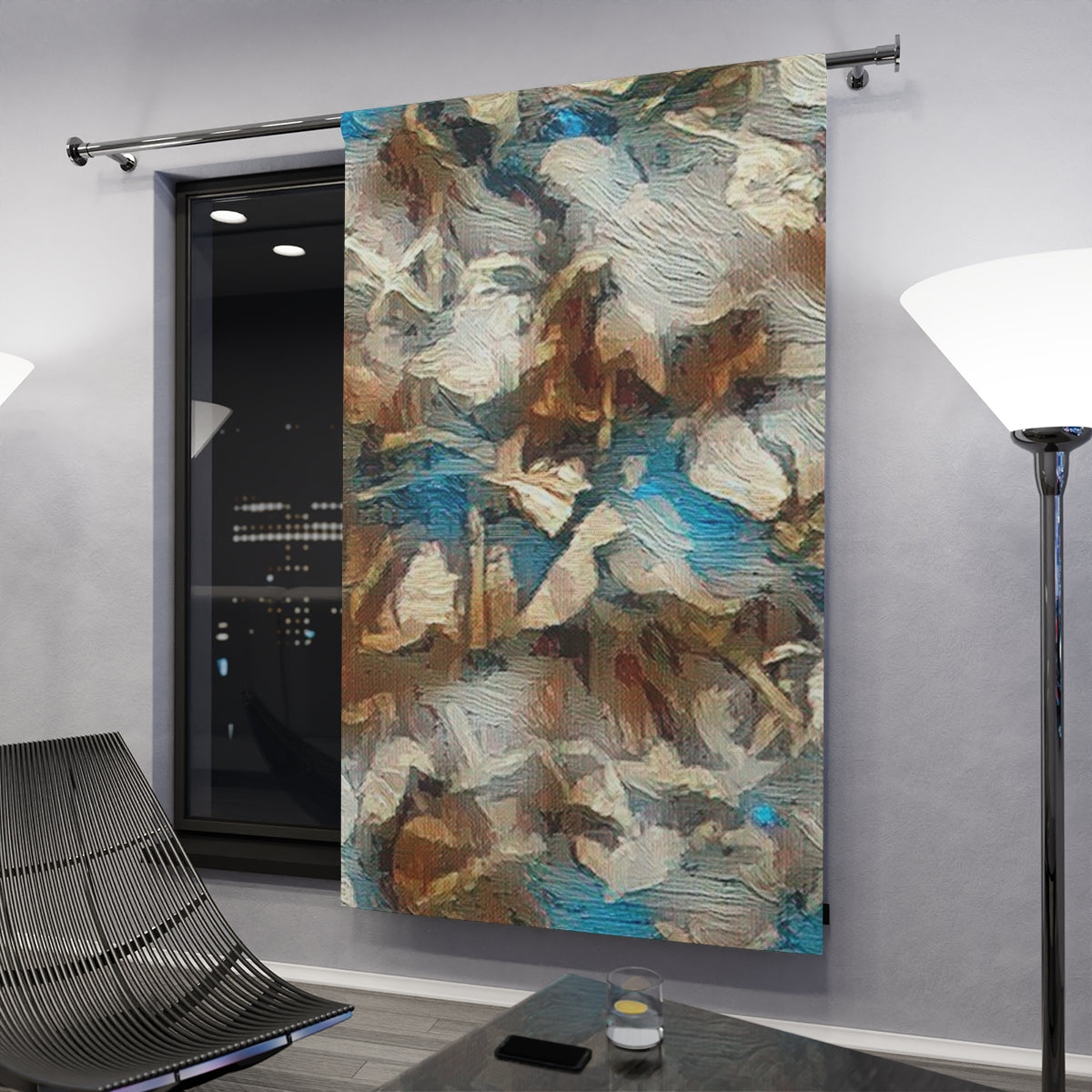 Earth-toned blackout curtain in a dim modern setting, brown and blue foliage textures absorbing warm indoor light beside a night window