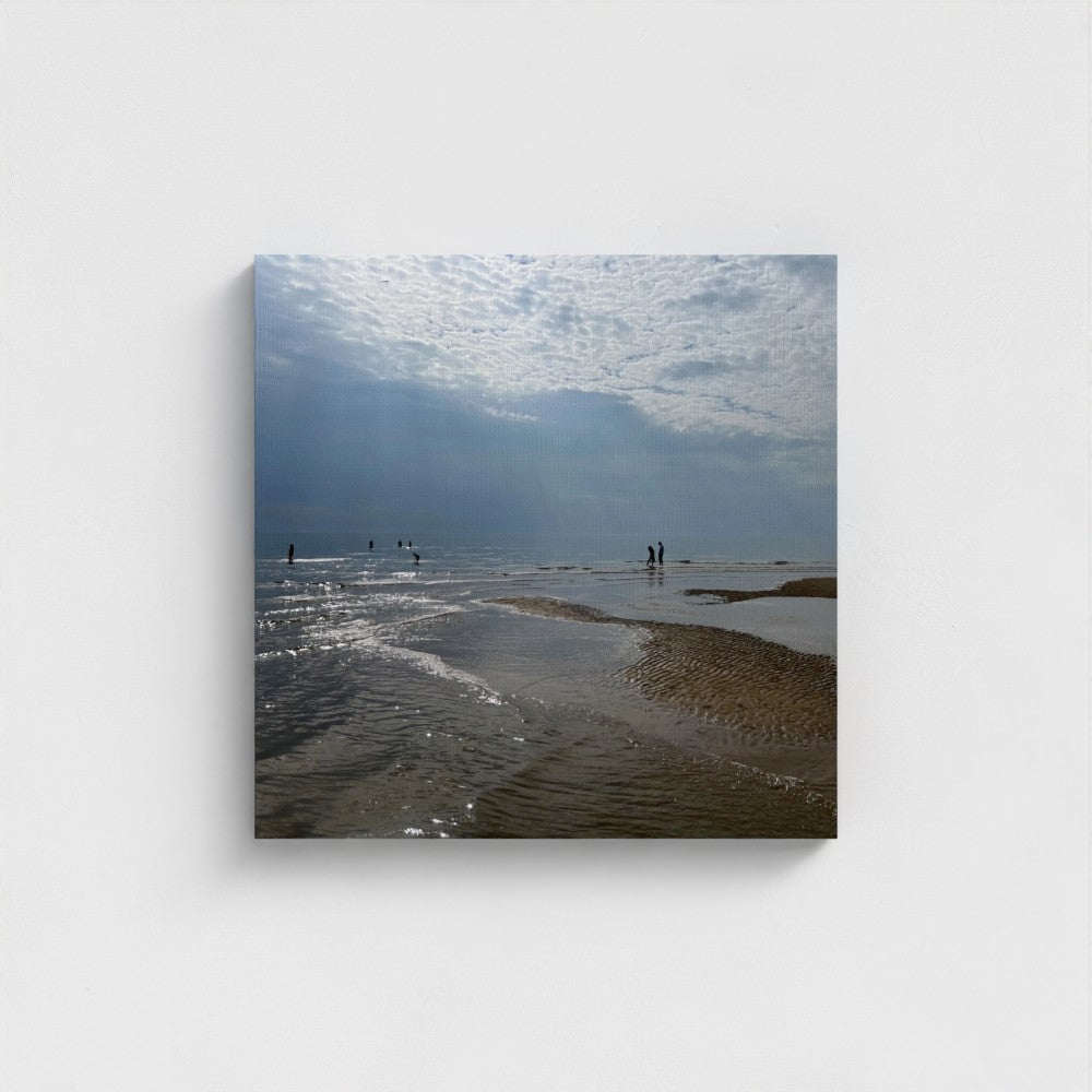 Square eco-friendly canvas print of Blackpool Beach with wet sand, rippling water, small figures in the distance, and dramatic cloudy sky