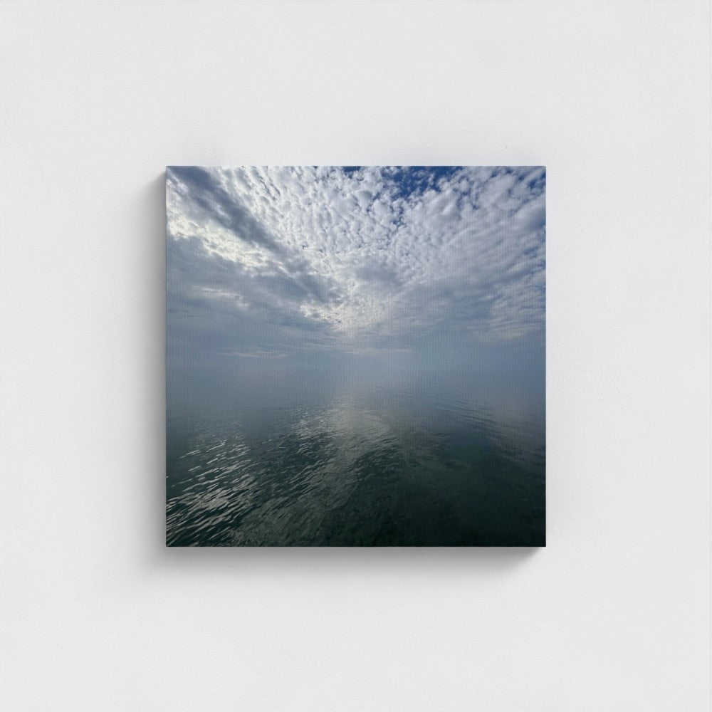 Square eco-friendly canvas print of Blackpool Horizon with layered clouds reflecting over calm water under a soft blue sky