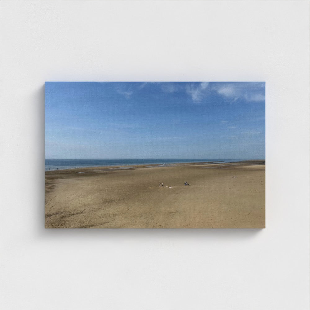 Eco-friendly canvas print of Blackpool Beach with wide sand, small figures in the distance, and a clear blue sky above calm sea