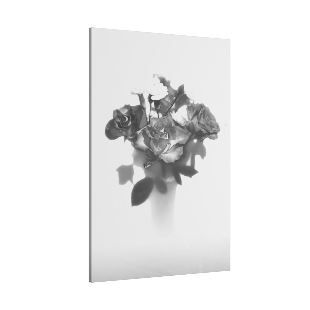 giclée canvas print featuring black and white photograph of roses
