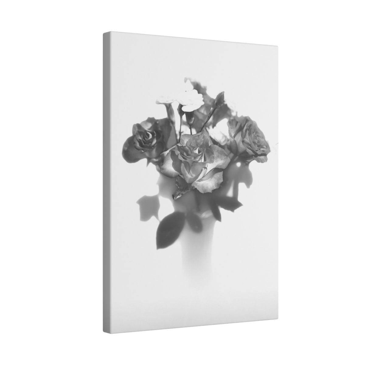 giclée canvas print featuring black and white photograph of roses