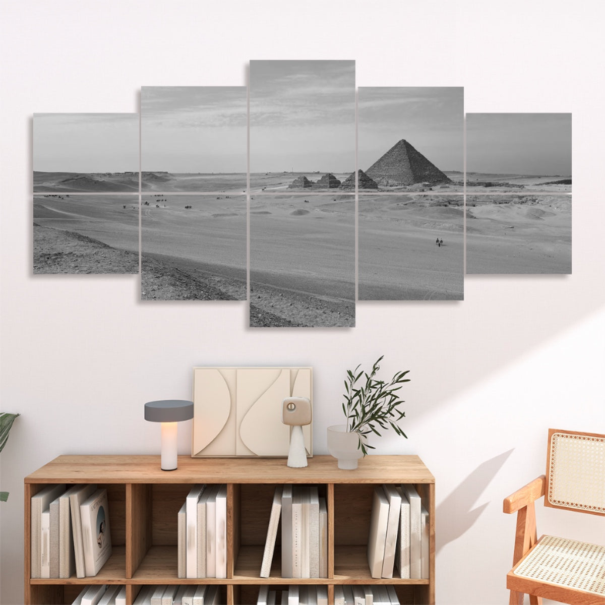 Ten panels rendering the pyramid and desert in smooth gray tones that highlight stone and sand textures
