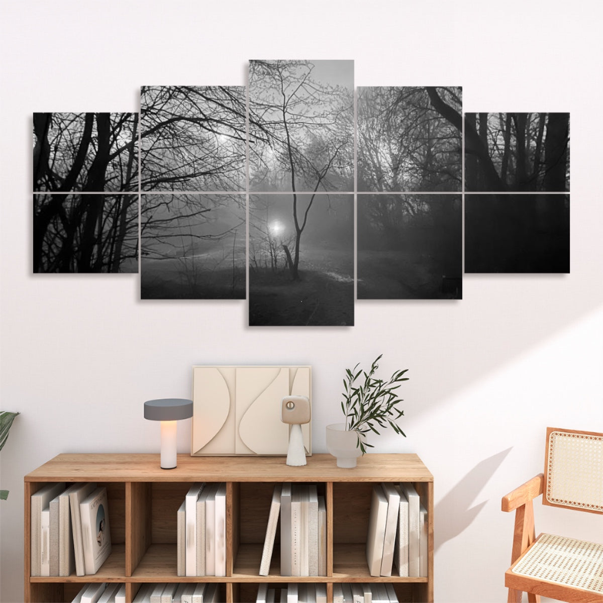 A balanced grayscale rendition of the misty forest: mid-tone grays replace dawn’s gold, and soft silver mist blurs the ground. Bare branches fade from charcoal to slate above, while the orb’s glow is a pale gray. The forest floor and winding trail appear in soft, muted grays