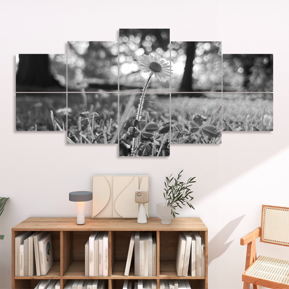 Grayscale version of a daisy standing in a sunlit field, shown across 10 decorative sound absorbing panels with soft tonal contrast.