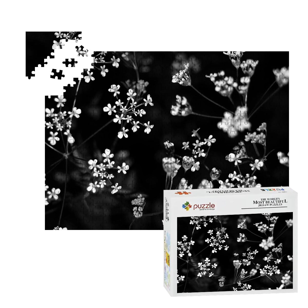 Grayscale 500-piece puzzle of white wildflowers with soft contrast and minimalist appeal.