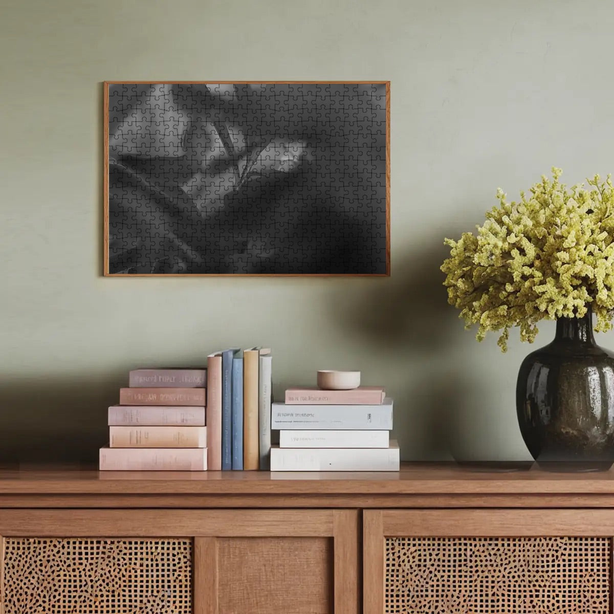 Greyscale version of red and green foliage jigsaw puzzle with soft-focus and blurred background