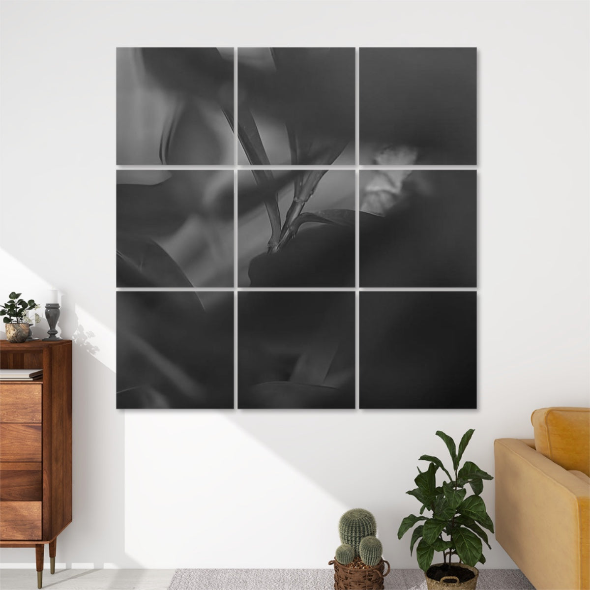 Greyscale 9‑panel acoustic wall art of abstract foliage with soft tonal gradients and blurred leaf forms.