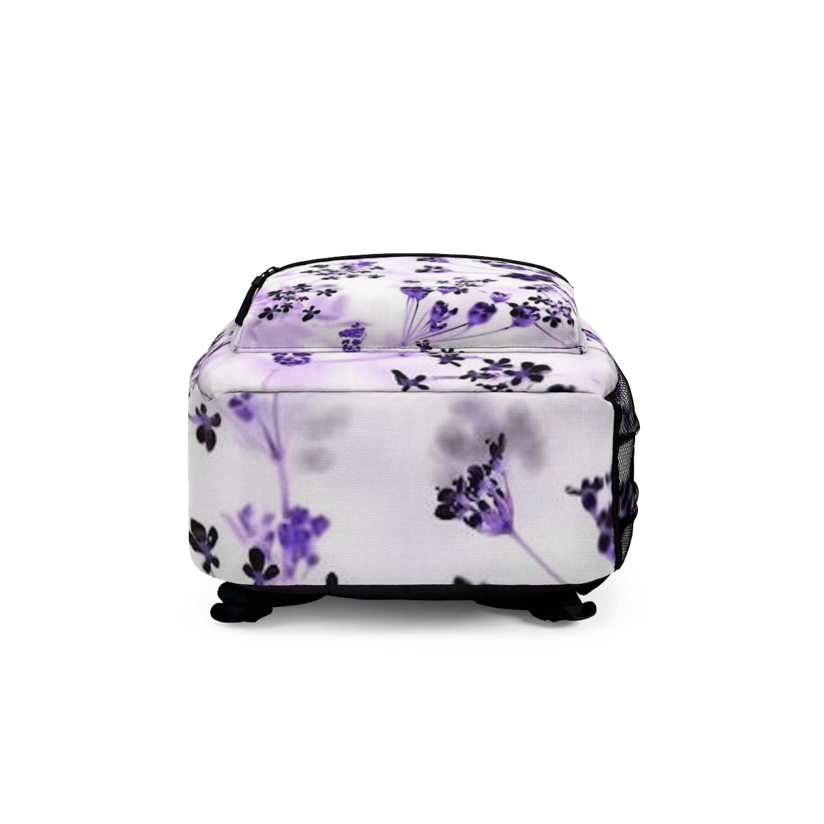 Underside of the inverted floral backpack, continuing the high-contrast wildflower pattern in a bold, graphic finish.