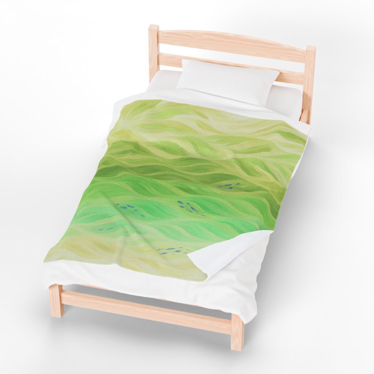 Fresh green throw with soft citrus gradients, shown in natural light on a light-wood frame bed