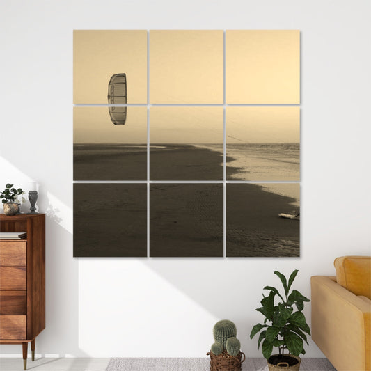Front view of 9-panel wall art showing a peaceful beach at sunset with a visible kite in the sky, rendered in warm sepia tones.