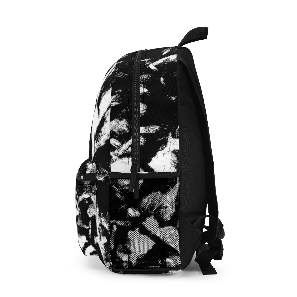 Left side of the backpack showing dynamic black and white brush textures and a black mesh pocket