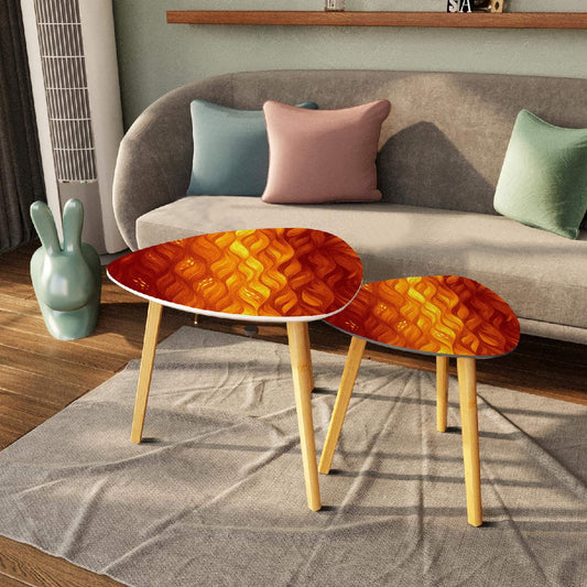 Pair of nested triangles with orange-amber leather tabletops in front of a gray sofa with pastel pillows; bamboo legs rest on a beige rug
