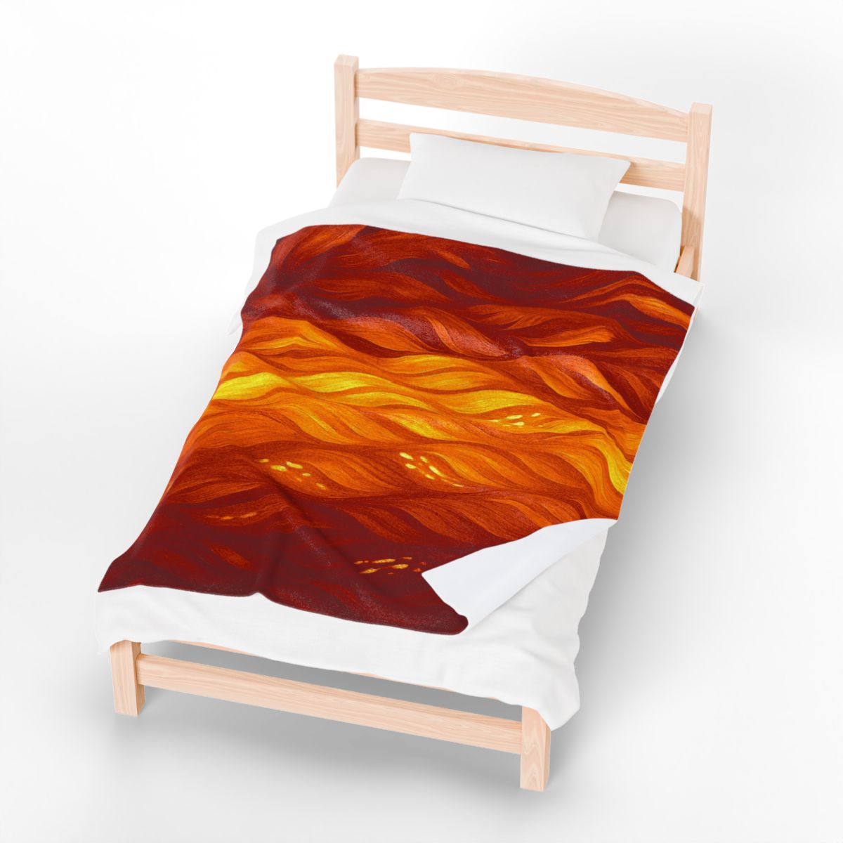Warm and bold orange–amber throw with red and yellow highlights, draped across a single mattress