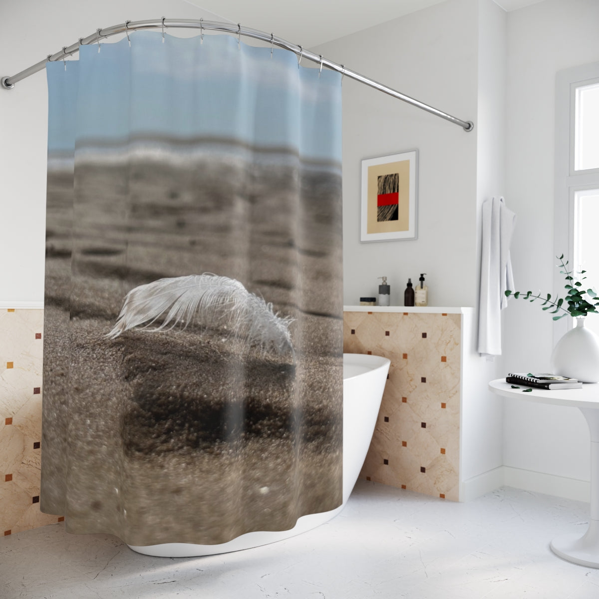 Seaside Feather curtain on a curved rod around a bathtub showing a feather on sand in a bright modern bathroom