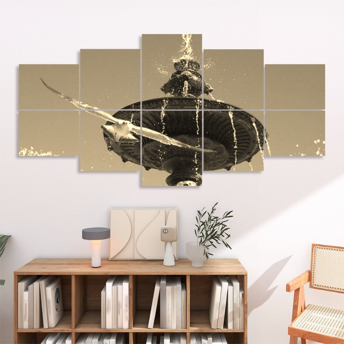 Ten sepia-toned panels depicting the Lisbon fountain with warm brown hues. The water streams and stonework of the basin take on amber shades, and a seagull glides overhead against a muted tan sky