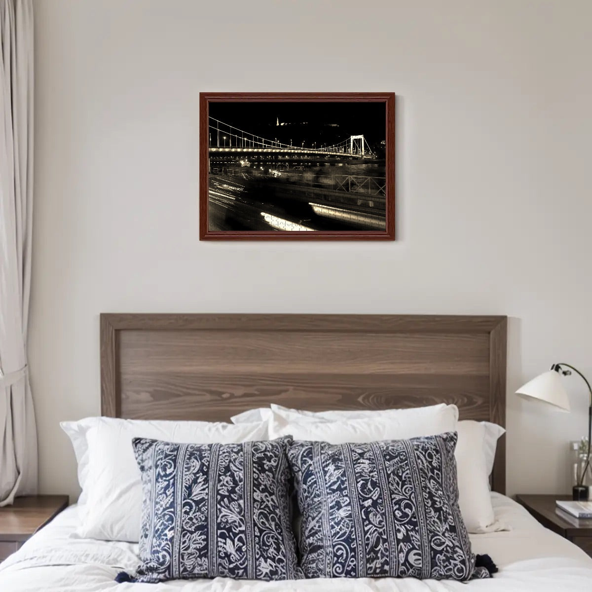 Sepia-toned photo of a Budapest bridge scene, highlighting classic European design in a vintage style.”