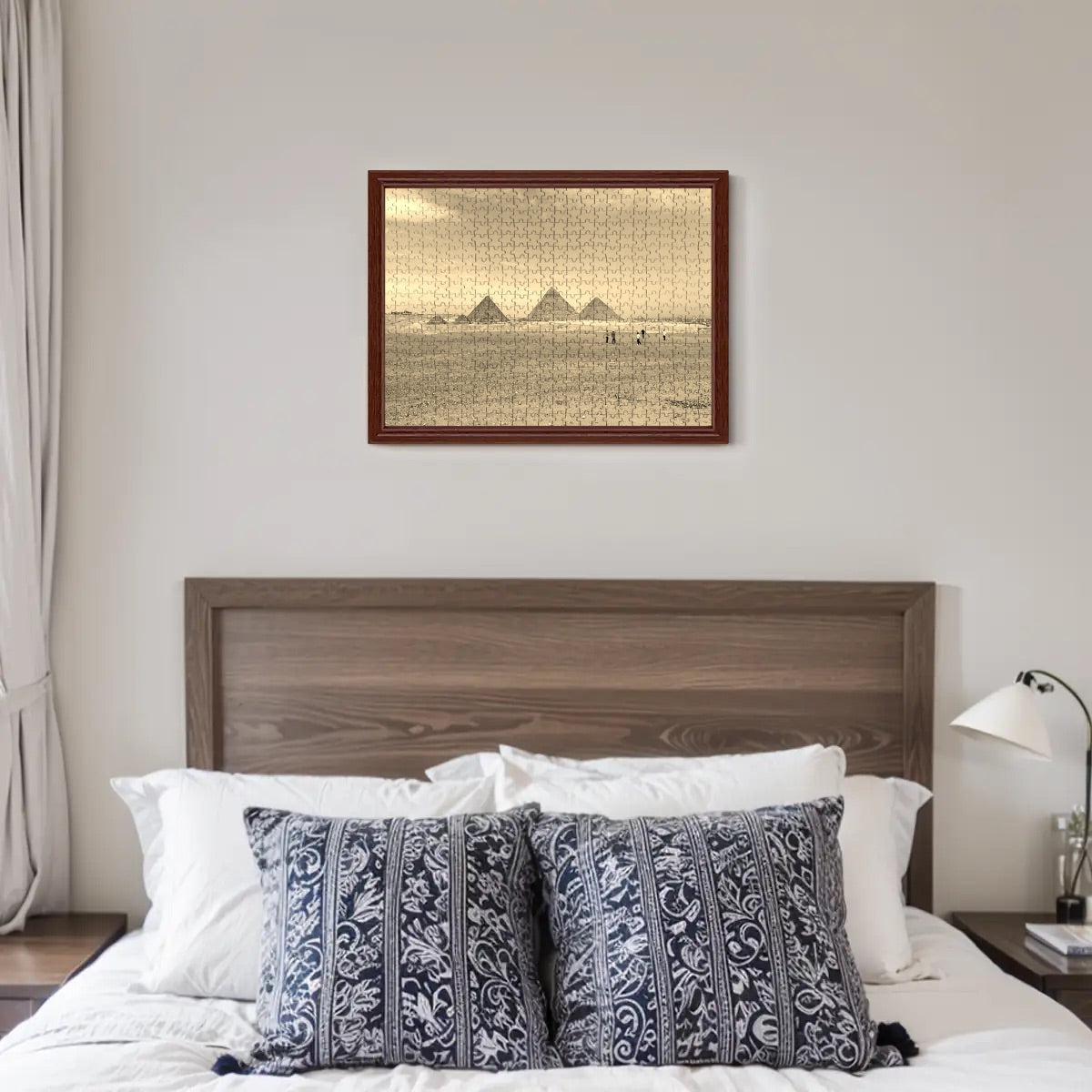 Sepia-toned photograph of the Pyramids of Giza, giving the image a timeless, historic feel.