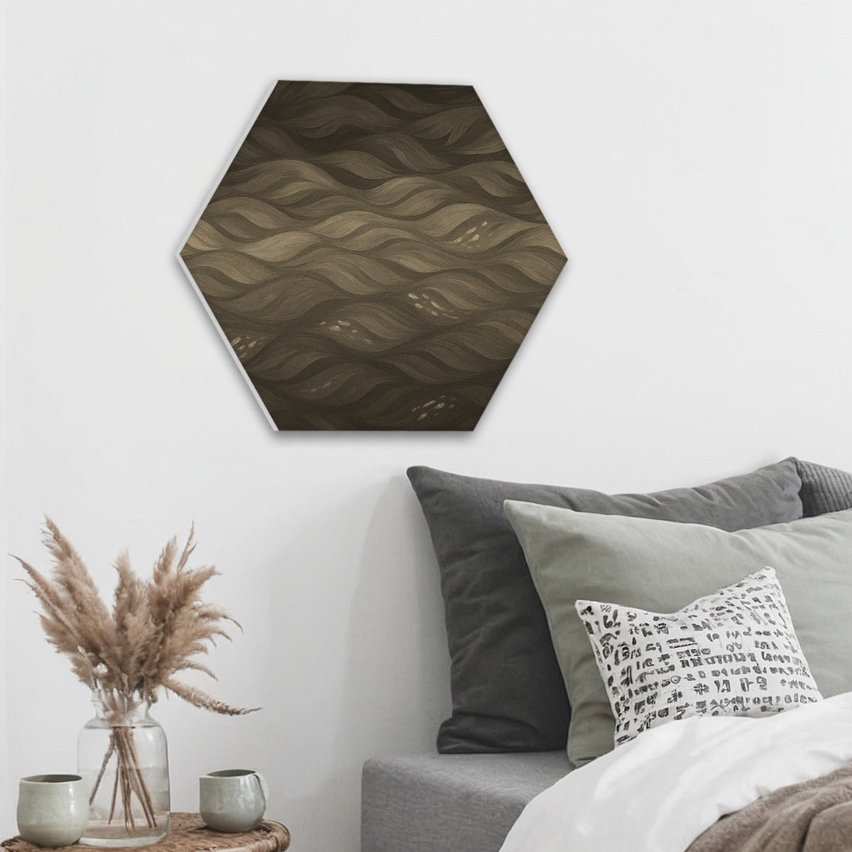 Sepia-toned version of the hexagonal acoustic panel with muted brown and gold waves, above white bedding and soft pillows.